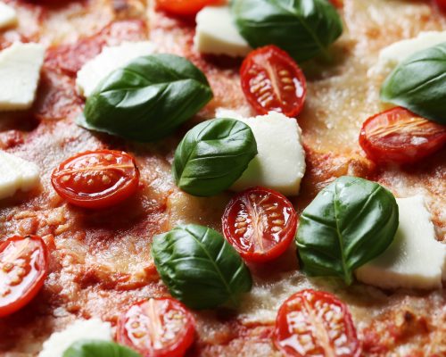 delicious-pizza-with-basil_144627-12364